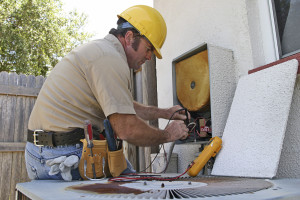 Air Conditioning Repairman Runs Tests